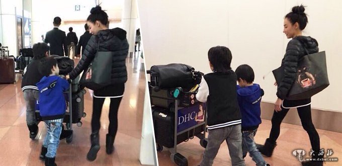 张柏芝赴日本度假 两儿子乖巧帮推行李